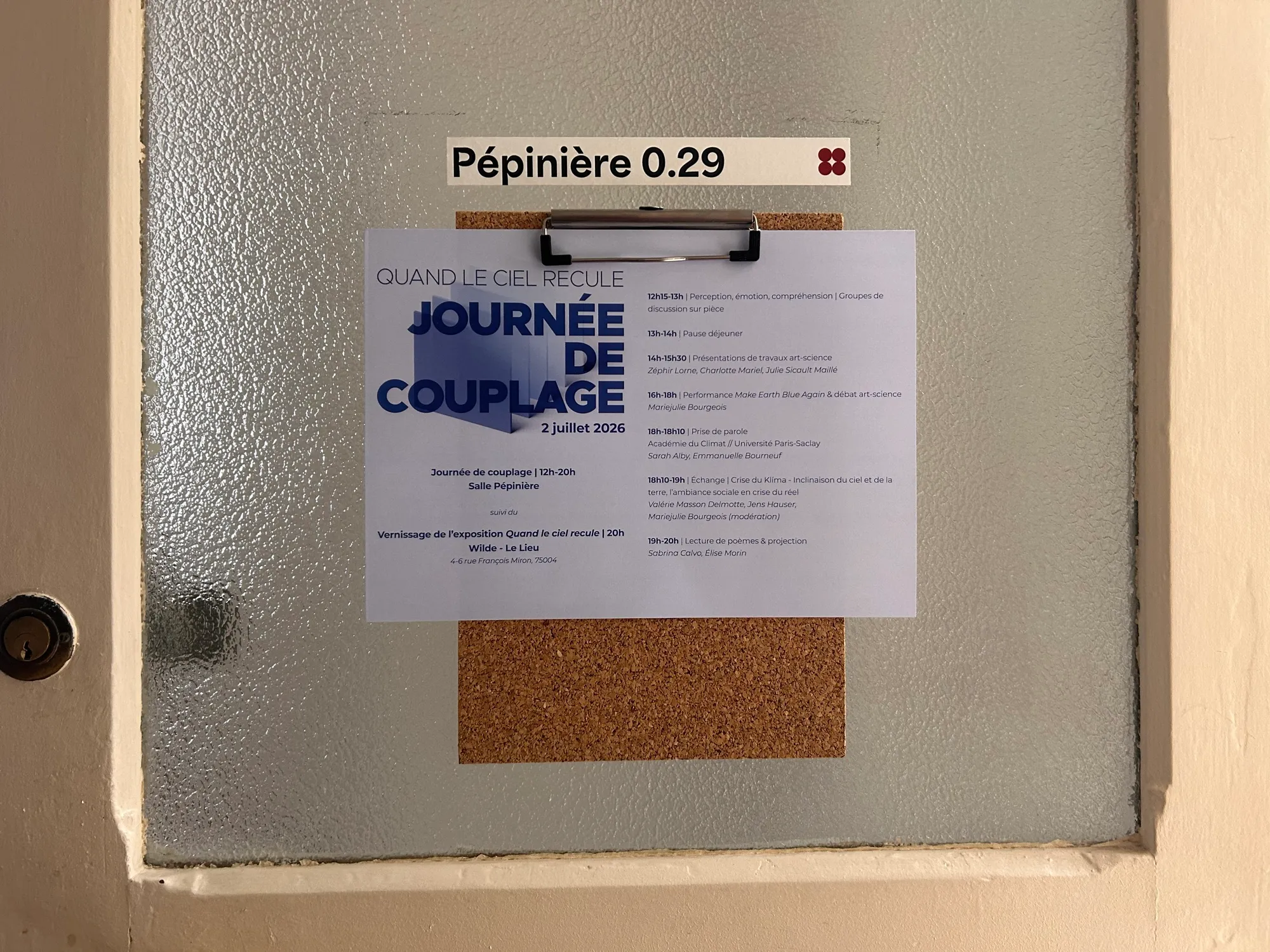 The poster on the door.