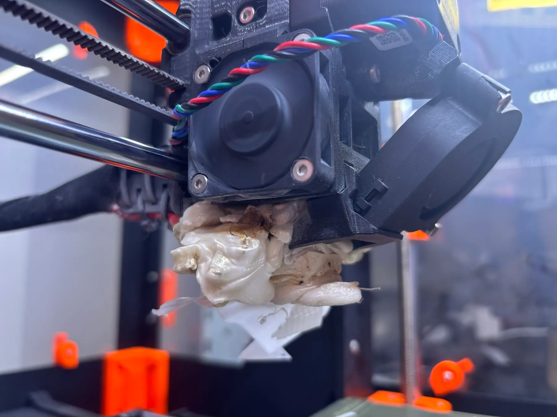 A failed print at Sony CSL Paris: a large blob of melted white filament has engulfed the 3D printer’s nozzle and print head