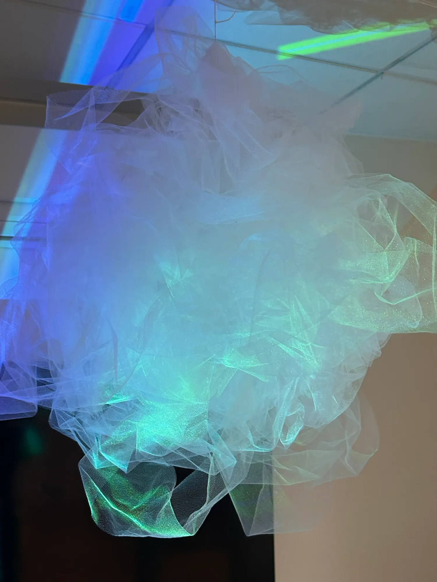 A projector lighting tulle.